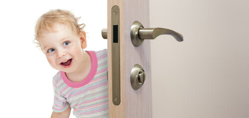 child opening door